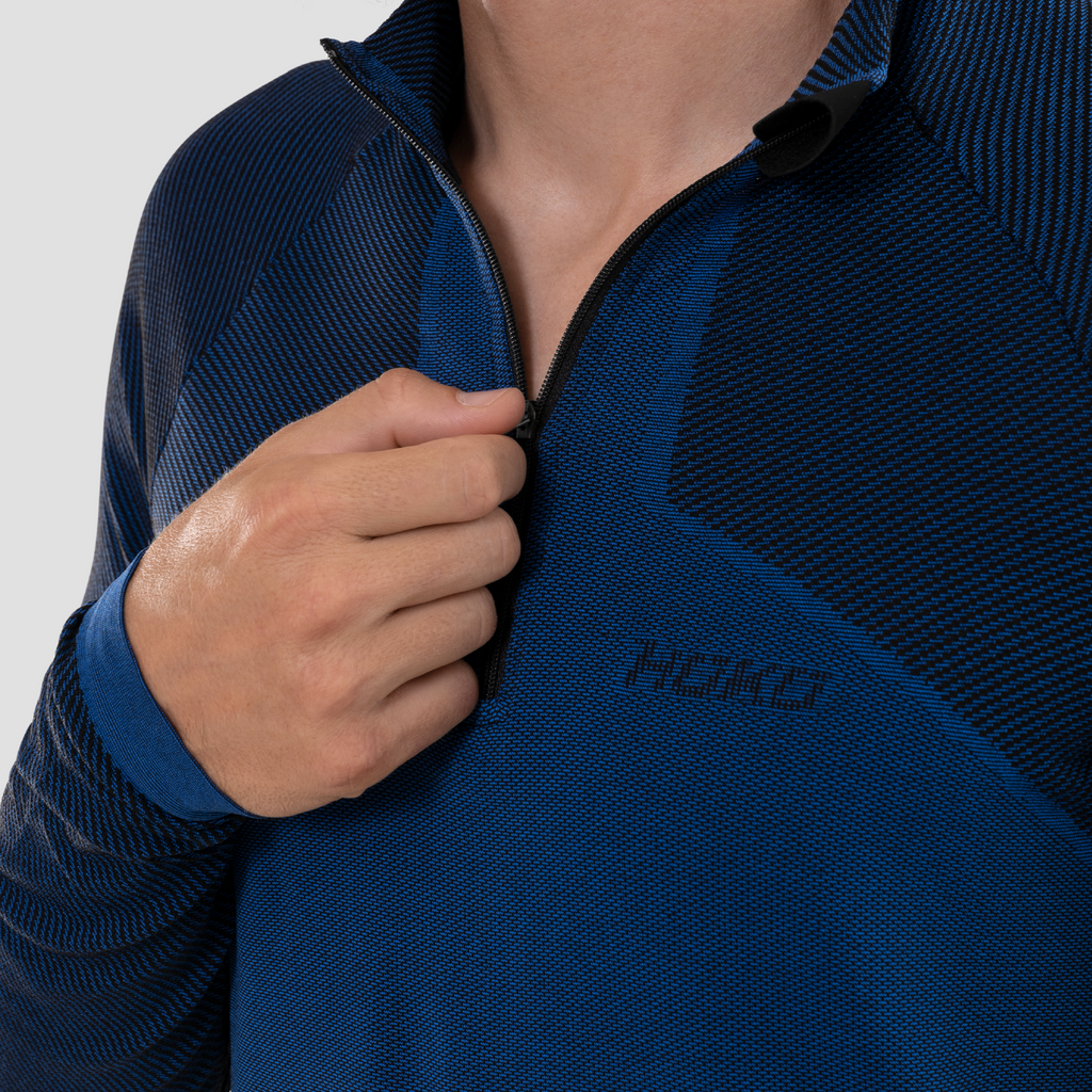 Camiseta térmica ultraligera de manga larga para hombre. Nombre del producto Bunkai. Color azul. Foto detalle cremallera